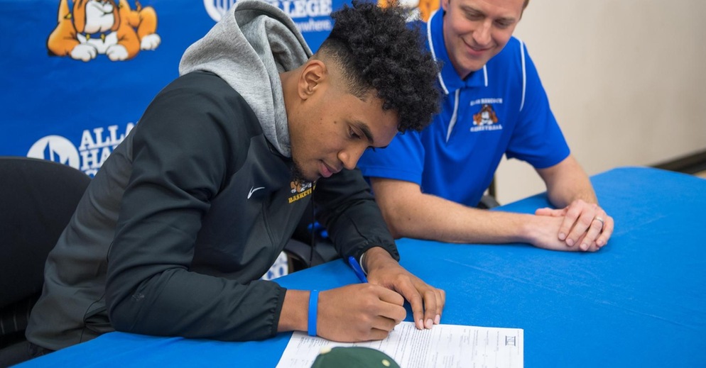 Hancock Men's Basketball Player Marcellus Garrick Signs with Cal Poly