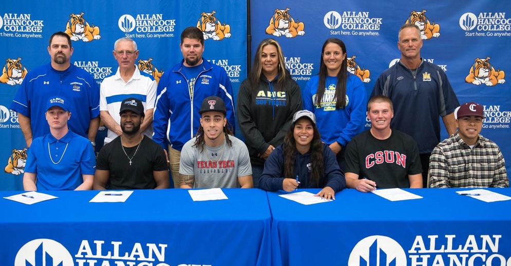 Six Hancock Student-Athletes Sign with Four-Year Universities